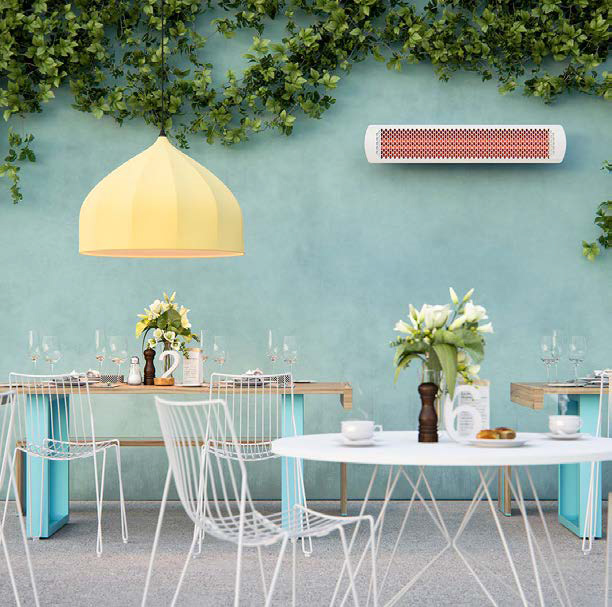 outdoor heater in cafe with ivy and white chairs